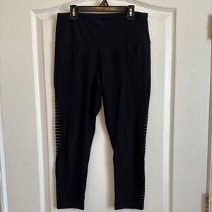 Black High-Waisted Capri Leggings with cut out side mesh detail